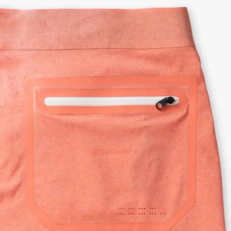 Outerknown Apex boardshorts in Heather Grapefruit showing the backpocket of the short