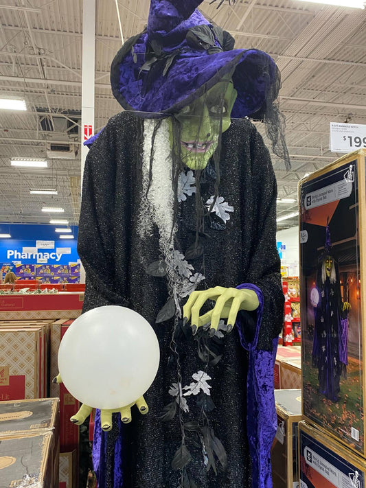 Large animated Halloween witch decoration on display at Sam's Club