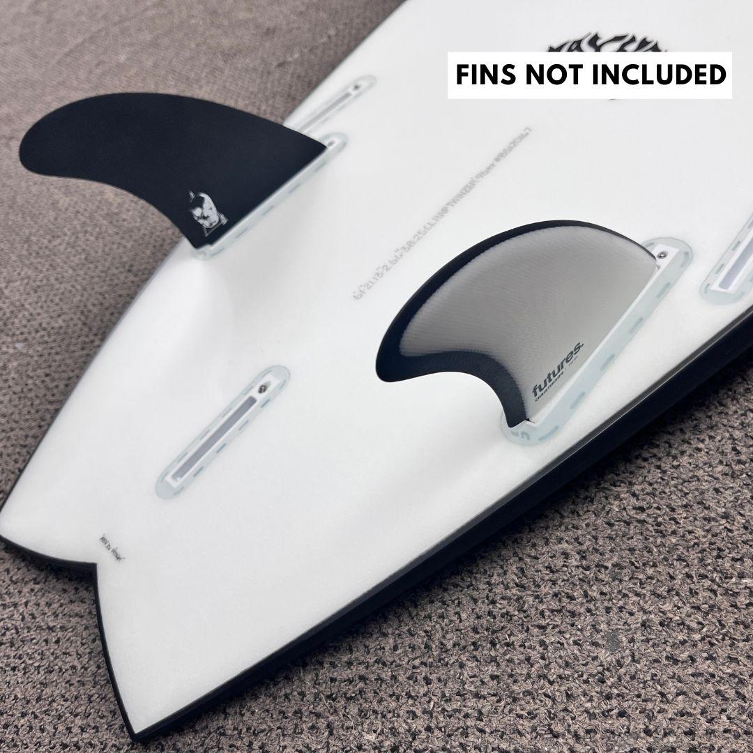 Lost RNF Twinzer 96'er Black Sheep, on a twin fin