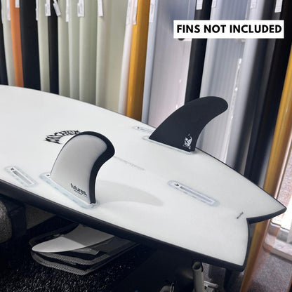 Lost RNF Twinzer 96'er Black Sheep, on a twin fin