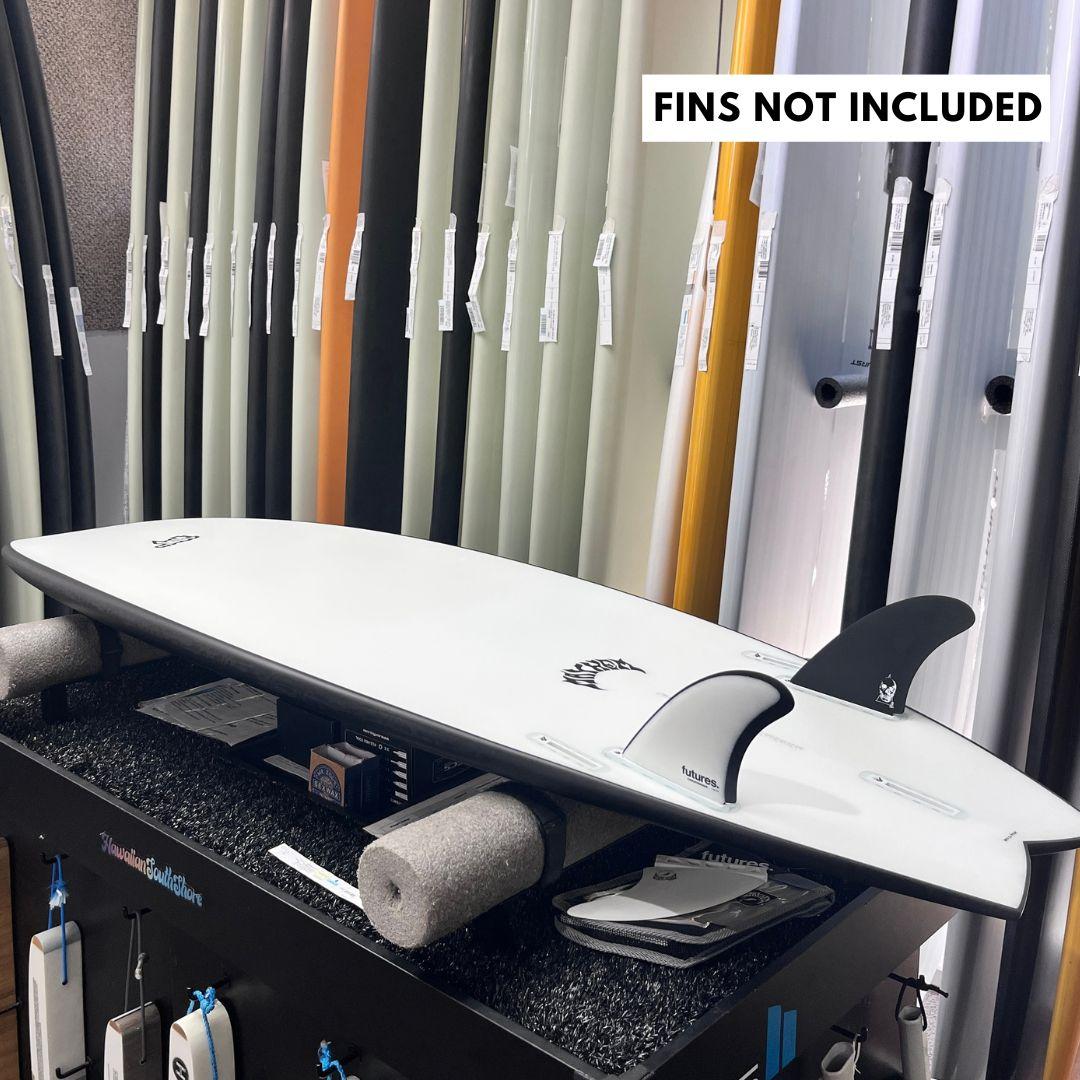 Lost RNF Twinzer 96'er Black Sheep, on a twin fin