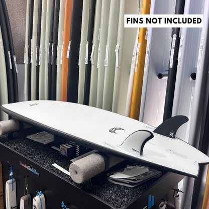 Lost RNF Twinzer 96'er Black Sheep, on a twin fin